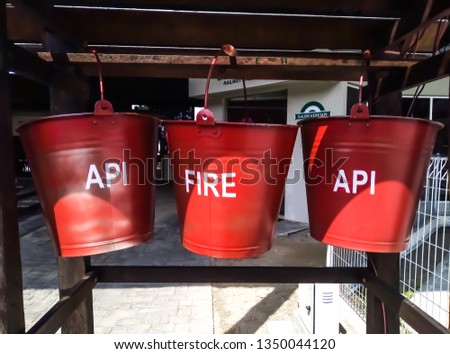 Fire bucket used to extinguisher fires. 