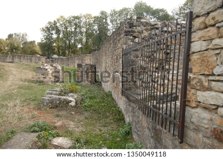 An old medieval fortress. Stone wall and elements of the fortress.