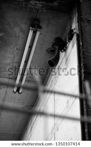 A loudspeaker in a concrete prison