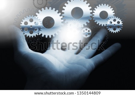 Human hand showing icons network on background