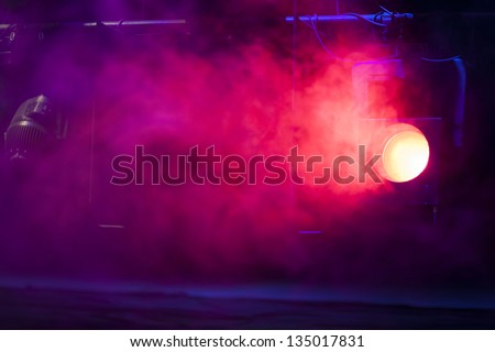 Stage lights on a console, smoke Royalty-Free Stock Photo #135017831