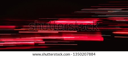 Abstract red light trails motion blurs
