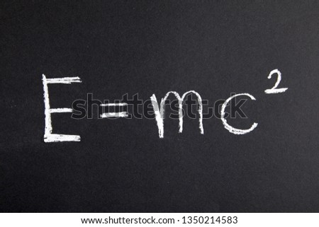 Formula E=mc2 On Blackboard Royalty-Free Stock Photo #1350214583