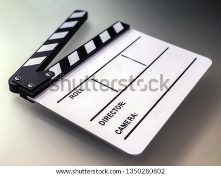 White blank clapperboard on set