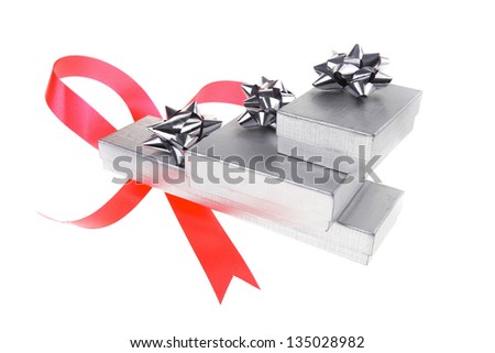 silver gift box with pink bow isolated over white background