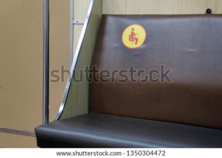 Place for the elderly in the subway car.