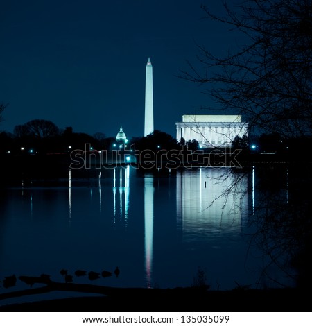 Taken from across the river, the Washington DC monuments reflecting in the Potomac River.