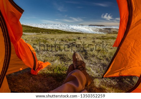 Hiker's view from a tent towards the Greenlandic icecap, Russell Glacier, Kangerlussuaq, Greenland