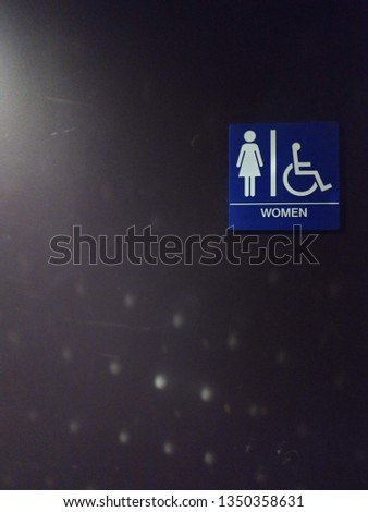 Ladies bathroom sign