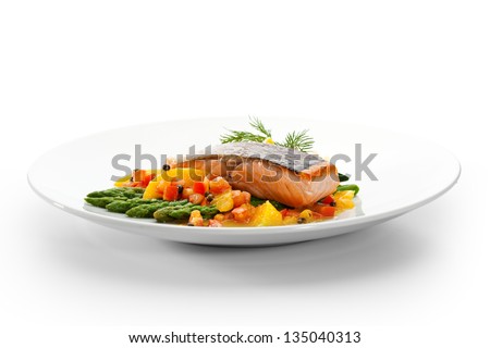 Salmon Steak with Fruits, Vegetables, Asparagus and Lemon Royalty-Free Stock Photo #135040313