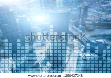Financial chart on blurred skyscraper office background.