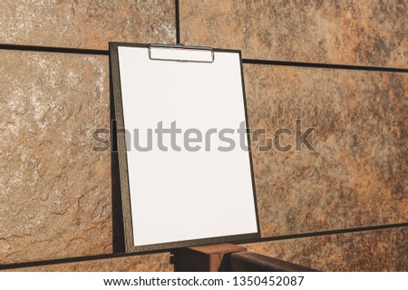 Mock Up of the tablet for the paper against the wall
