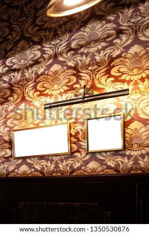Wall of blank frames and whiteboards in pub interior - Mock up, billboard, ad space indoors