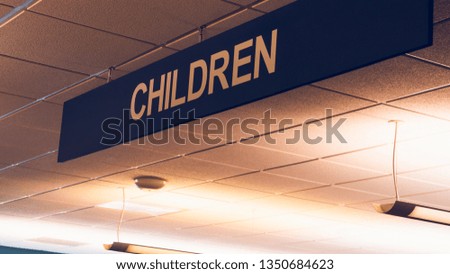 Children sign on ceiling
