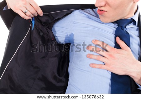 business man with sweating under armpit in blue shirt, isolated on white Royalty-Free Stock Photo #135078632
