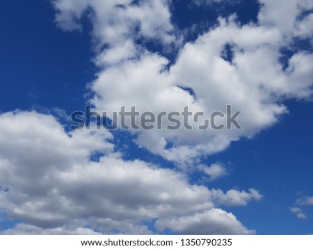 Beautiful cloudscape bright blue sky with fluffy clouds nature background