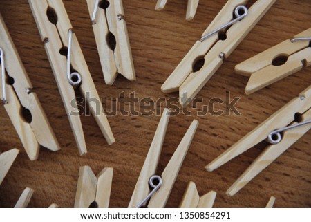 wooden clothespins on the table
