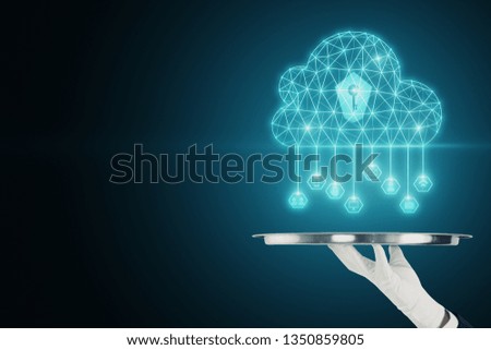 Hand holding tray with glowing digital cloud on blue background. Cloud computing and technology concept 