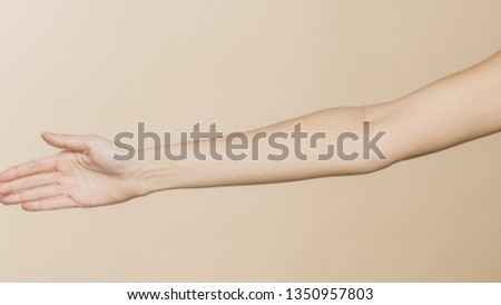 a welcoming feminine hand