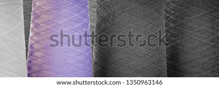 Colorful reels of threads. web banner background