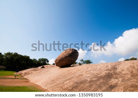 Krishna's butterball, the giant natural balancing rock in Mahabalipuram, Tamil Nadu, India  Royalty-Free Stock Photo #1350983195