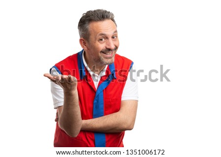 Male store owner or hypermarket employee making obvious solution gesture with palm and trustworthy expression isolated on white Royalty-Free Stock Photo #1351006172