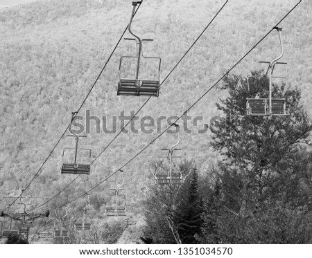Black and white picture of chairlift in Sutton Quebec Canada in fall time