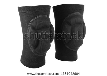 knee protection during sports, joint support, elastic black bandage, a pair on a white background, isolate Royalty-Free Stock Photo #1351042604