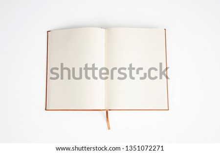 Opened Blank Notebook On White  Royalty-Free Stock Photo #1351072271