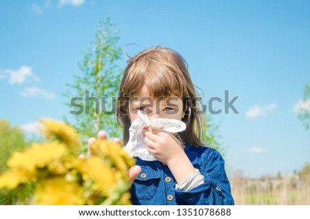 Seasonal allergy in a child. Coryza. Selective focus. nature