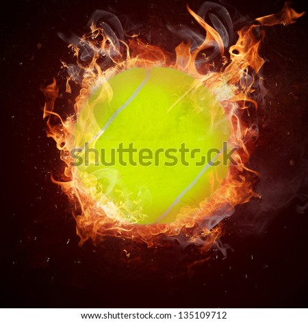Hot tennis ball in fires flame