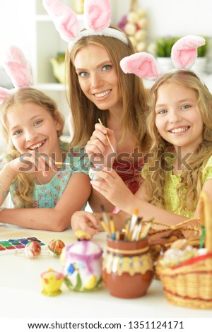 Close-up portrait of family preparing for Easter