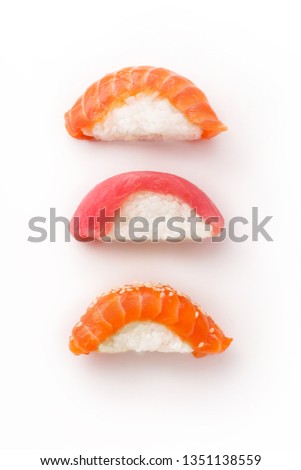 Creative layout with various sushi on white background