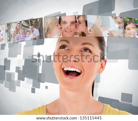 Smiling woman looking up at a picture bar