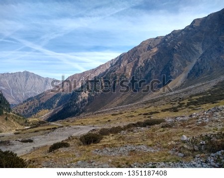 Steep mountain slope on autumn day in mountains