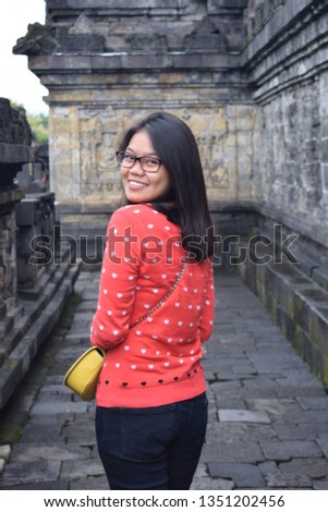 Portrait of asian girl pose in tample, Smile asian girl.