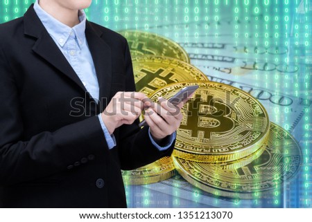 Business woman investment futuritic bitcoin cryptocurrency and money investing.Conceptual design for technology of Cryptocurrency.