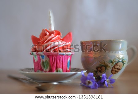 Delicious colorful cupcakes -unicorns with cheese cream for children's birthday. 