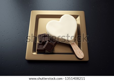 White chocolate ice cream with a heart shape and chocolate ounces on a plate
