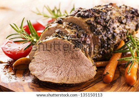 veal roast with vegetables Royalty-Free Stock Photo #135150113