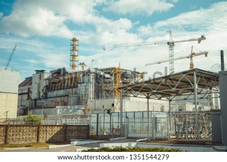 Fourth reactor without enclosing sarcophagus. Chornobyl Nuclear Power Plant - ChNPP. Radioactive zone in Pripyat city - abandoned ghost town Royalty-Free Stock Photo #1351544279