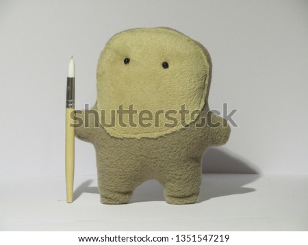 
3d plush toy with brush on white blank background