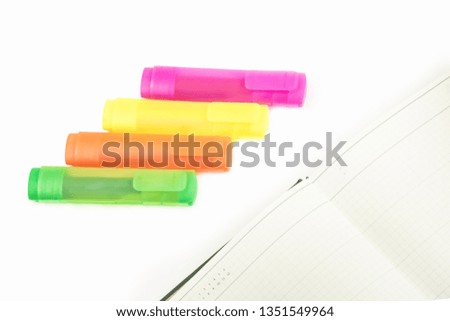 isolated yellow, orange, green and purple markers 