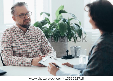 Young successful man struggling with work problems Royalty-Free Stock Photo #1351552718