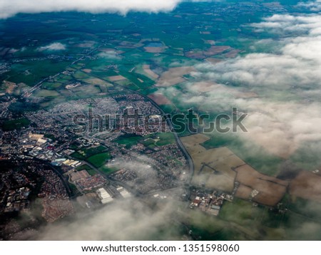 Shot of the English Countryside near london taken from flight during take off