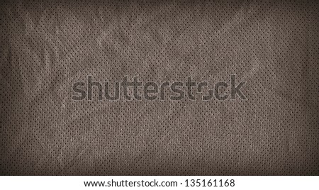 Perforated fabric background or texture close up