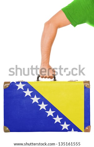 The Bosnia and Herzegovina flag on a suitcase. Isolated on white.
