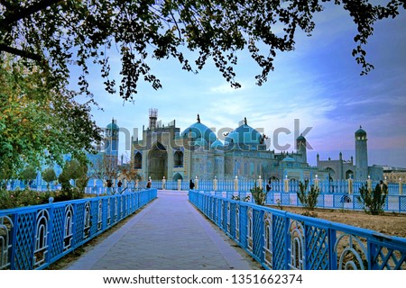 Mazar-i-Sharif is home to one of the most beautiful mosques in Afghanistan (in Image) and is located in close proximity to both Uzbekistan and Tajikistan. It is also home to an international airport. Royalty-Free Stock Photo #1351662374