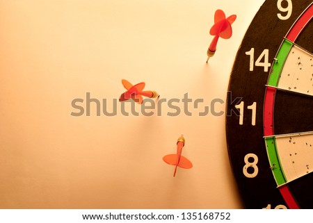 darts arrows missed their target Royalty-Free Stock Photo #135168752