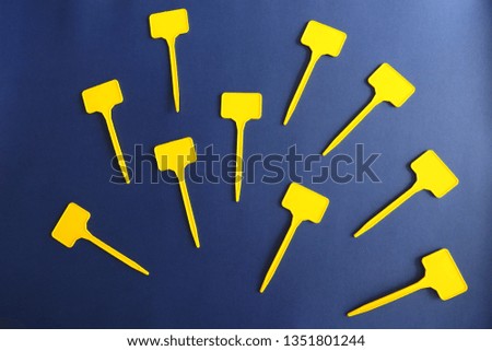 Empty Yellow Labels on Blue Background